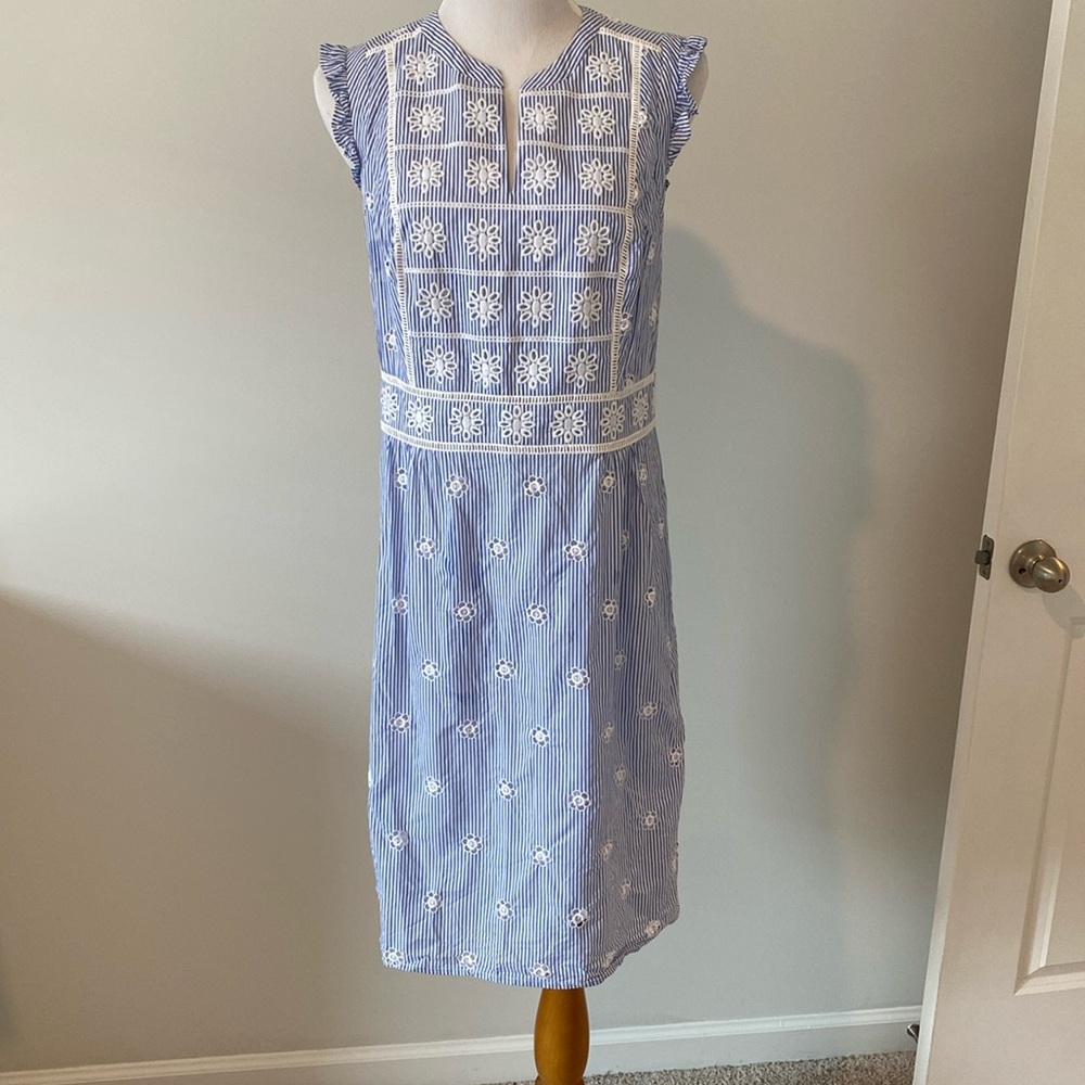 Women’s blue and white dress.